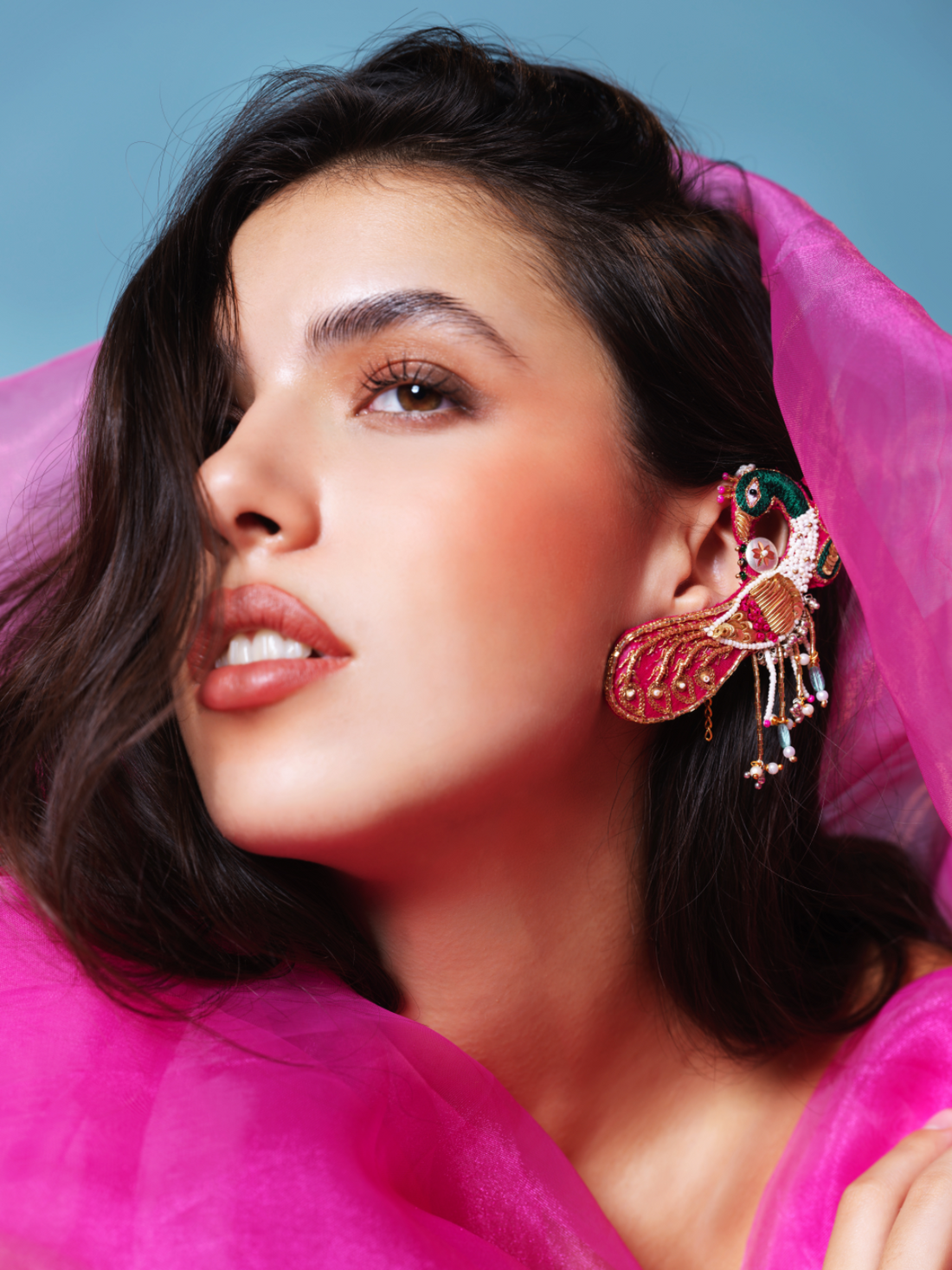 Bhagyahsree- Zardosi embroidered earcuffs with Peacock motifs