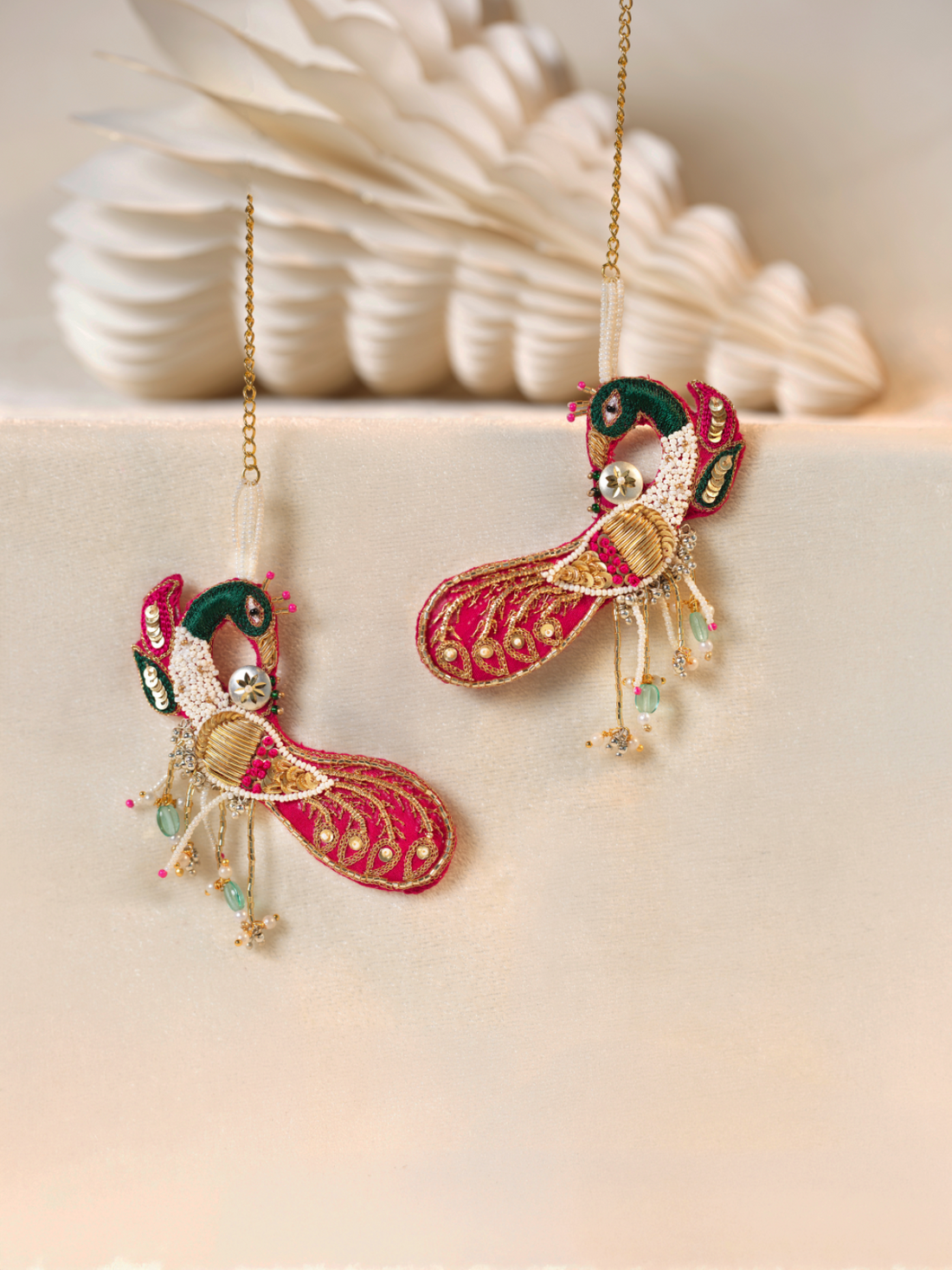 Bhagyahsree- Zardosi embroidered earcuffs with Peacock motifs