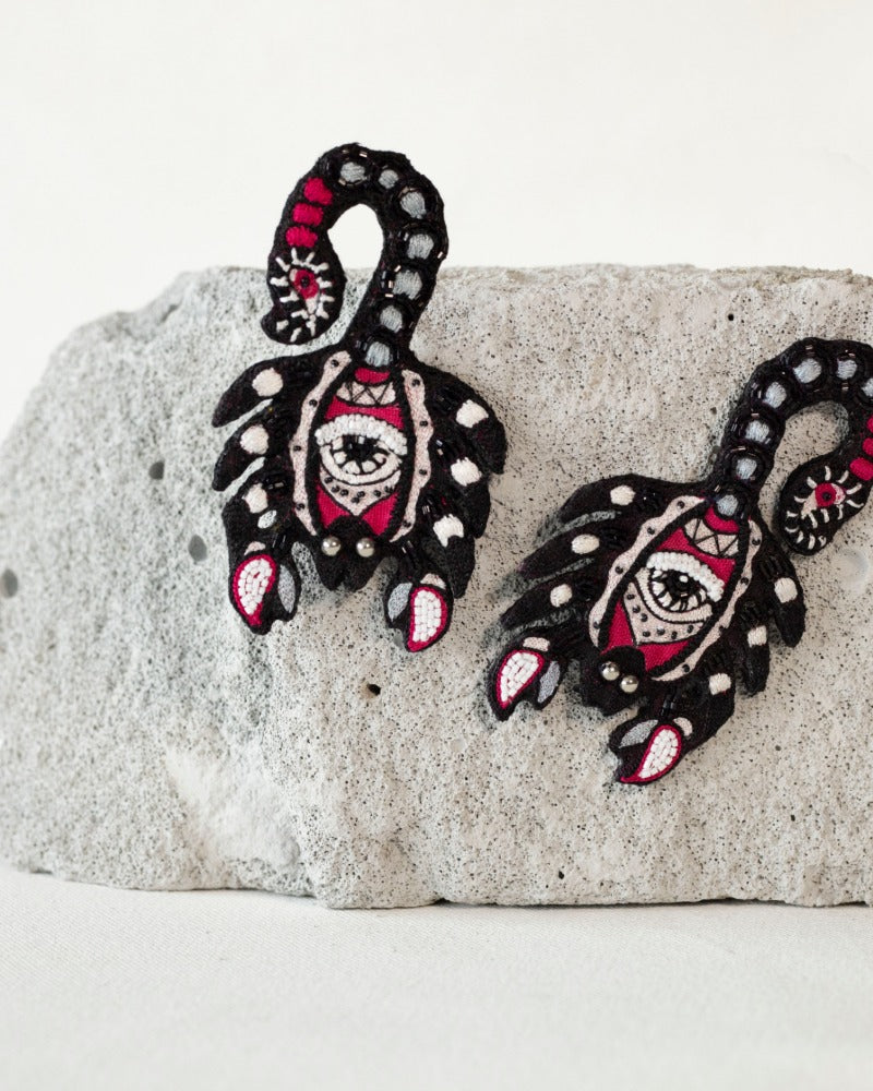 Damn! Handmade scorpio earrings