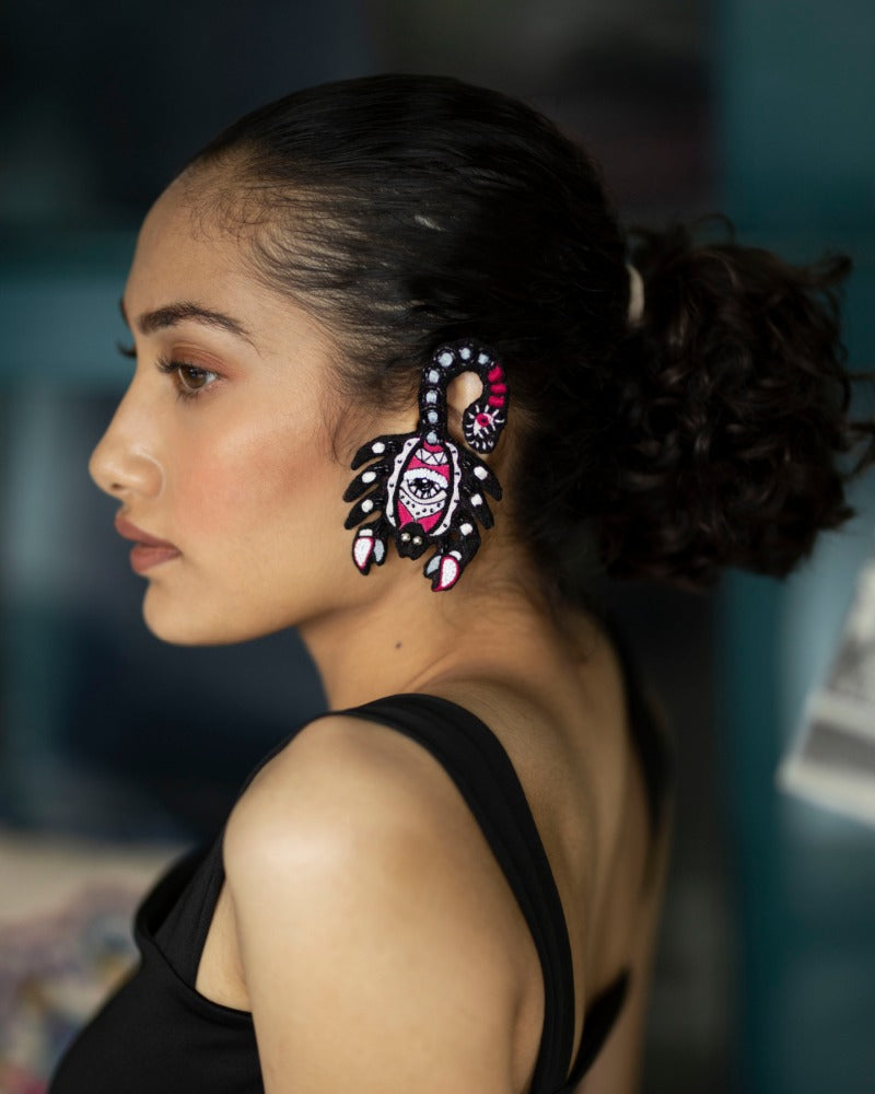 Damn! Handmade scorpio earrings
